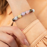 Women's creative inspiration bracelet made with natural Chalcedony, Tourmaline, and Aquamarine.